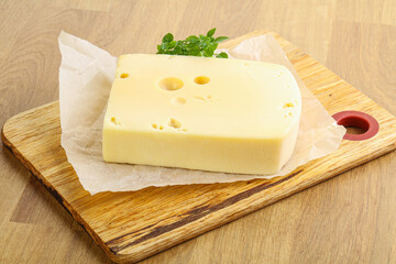 Maasdam cheese over the board