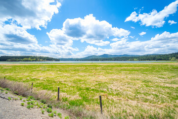 Obraz premium The wide marshland and lake at McKenzie Conservation Area at Newman Lake, Washington, USA