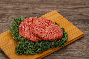 Raw beef burger cutlet for cooking