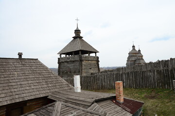 Obraz premium Wooden church. Wooden building on Zaporozhye Sich in Ukraine. Medieval church on island of Khortitsa in Zaporozhye