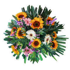 Funeral bouquet garland flower arrangement mixes sunflowers and gerberas with statice flowers and tropical foliage fern, philodendron and palm leaves isolated on white background with clipping path.