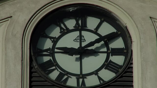 Looking Up at an Antique Clock on Facade of an Old Municipal Building in Tigre, Buenos Aires. Close Up. 