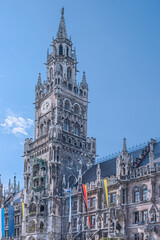 Fototapeta na wymiar The New Town Hall (German: Neues Rathaus) is a town hall in neo-gothic style at the Marienplatz. In 1874 the municipality had left the Old Town Hall for its new domicile. Munich, May 2014