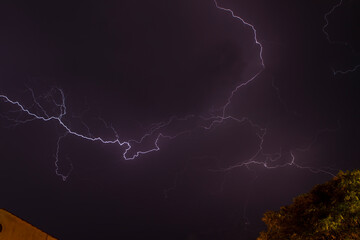 Stormy night sky and thunderbolts