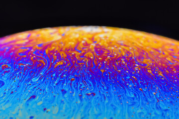 Beautiful psychedelic abstractions on the surface soap bubbles