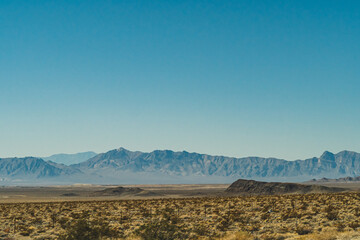 Fototapeta na wymiar Arid Mountains landscape against clear blue sky in Nevada