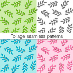 Set of four foliage seamless patterns. Branches with leaves, different colour combinations, include green, blue, pink, black. Trendy flat style, floral decoration and backgrounds. Vector illustration