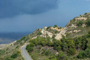 The ancient Greek chapel is located at the top of the mountain.