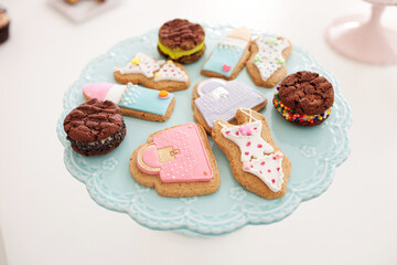 Close up image of assorted colorful cakes and biscuits
