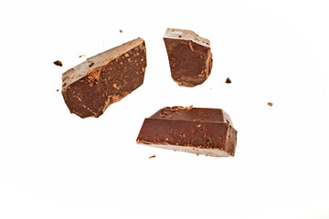 Chocolate pieces isolated on a white background. Top view.
