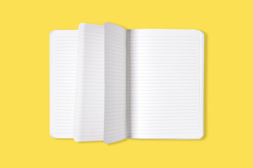 Blank open office Notepad or notebook with flipping pages isolated on yellow background. Mock up. Top view.