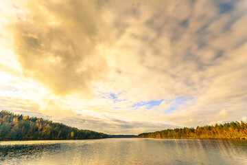 Evening on a forest lake. View from the shore level
