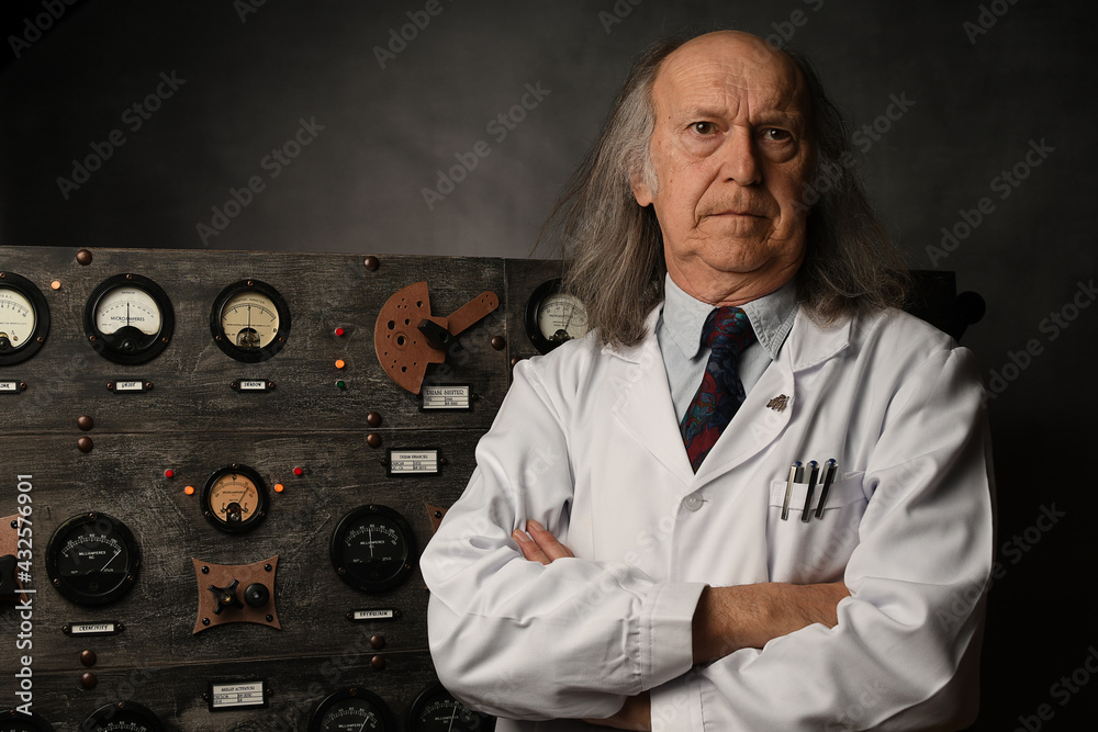 Wall mural portrait of a scientist working in its laboratory, doing a physics experiment, with some vintage ins