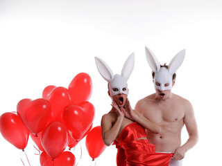 rabbit with balloon. Sexy couple. Mask. Fun. Crazy photo. Valentine day. 