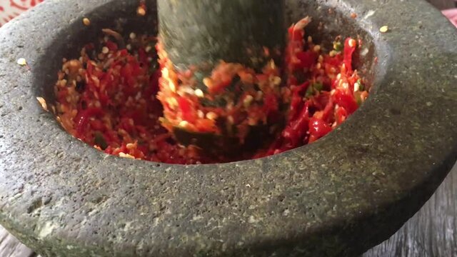 close up red hot chili in mortar