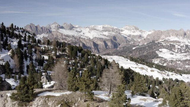 Aerial flight adove Alp Mountains and forest 
High mountain peaks sharp cliffs Dolomites, Italy
Drone view  from Italy Top Peaks 

