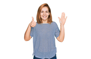 Young caucasian woman wearing casual clothes showing and pointing up with fingers number six while smiling confident and happy.