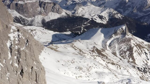 Aerial flight adove stunning Alps. 
High mountain peaks sharp cliffs Dolomites, Italy
Drone view  from Italy Top Peaks 
