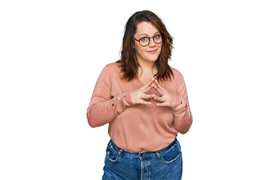 Young plus size woman wearing casual clothes and glasses hands together and fingers crossed smiling relaxed and cheerful. success and optimistic