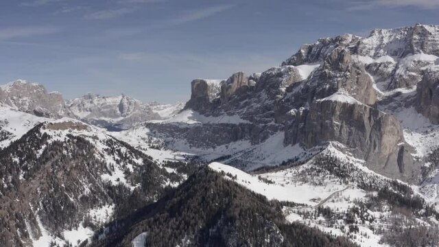 Aerial flight adove stunning Alps. 
High mountain peaks sharp cliffs Dolomites, Italy
Drone view  from Italy Top Peaks 

