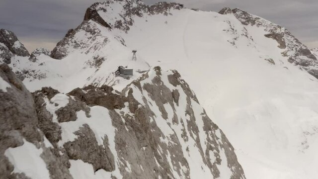 Aerial flight adove stunning Alps. 
High mountain peaks sharp cliffs Dolomites, Italy
Drone view  from Italy Top Peaks 
