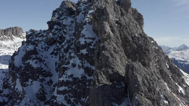 Aerial flight adove stunning Alps Cliffs. 
High mountain peaks sharp cliffs Dolomites, Italy
Drone view  from Italy Top Peaks 

