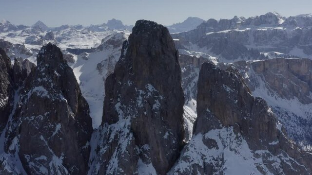 Aerial flight adove stunning Alps Cliffs. 
High mountain peaks sharp cliffs Dolomites, Italy
Drone view  from Italy Top Peaks 

