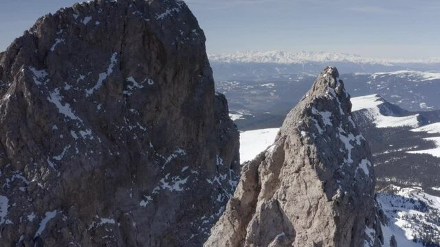 Aerial flight adove stunning Alps Cliffs. 
High mountain peaks sharp cliffs Dolomites, Italy
Drone view  from Italy Top Peaks 


