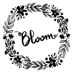 Fototapeta premium Bloom. Inspirational handwritten quote surrounded by floral elements.