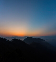Fototapeta premium A beautiful shot of landscape under a cloudy sky in Tekilatlakpan at sunset
