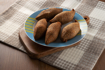 Kibbeh - Minced meat from the Middle East. Fried snack a typical Brazilian popular party dish (kibe)