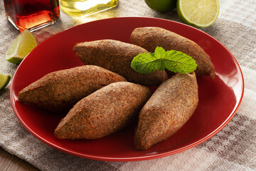 Kibbeh - Minced meat from the Middle East. Fried snack a typical Brazilian popular party dish (kibe)