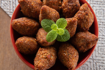 Kibbeh - Minced meat from the Middle East. Fried snack a typical Brazilian popular party dish (kibe). Top view