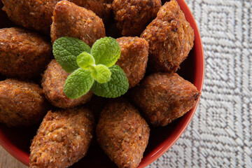 Kibbeh - Minced meat from the Middle East. Fried snack a typical Brazilian popular party dish (kibe). Top view