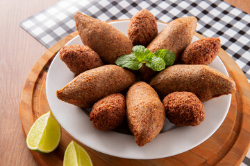 Kibbeh - Minced meat from the Middle East. Fried snack a typical Brazilian popular party dish (kibe)