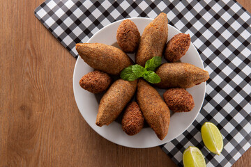 Kibbeh - Minced meat from the Middle East. Fried snack a typical Brazilian popular party dish (kibe). Top view