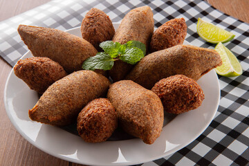 Kibbeh - Minced meat from the Middle East. Fried snack a typical Brazilian popular party dish (kibe)