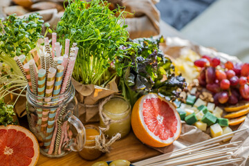 Fototapeta premium Close up table serve vegetarian food and drink preparing for birthday party or celebrating holiday