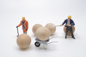 mini people worker move wood for import and export