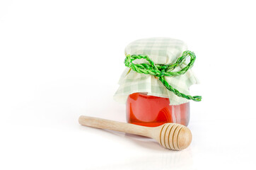 Closed up fresh organic honey in glass bowl on white background