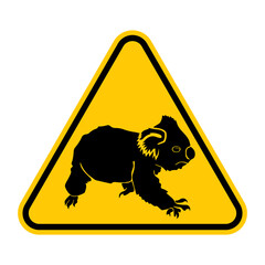 Koala road sign. Vector illustration of yellow triangle warning sign with koala icon inside. Koalas crossing warning symbol isolated on white background. Australian animal sign. © Fast_Cyclone
