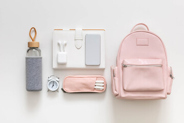 Female backpack stationery, clothes. Student bag storage organization. Concept of back to school