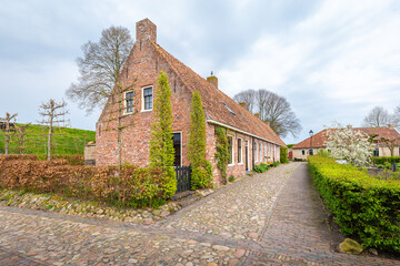 Fototapeta na wymiar Street view of the Dutch fortified little village Bourtange in Westerwolde, Groningen in The Netherlands