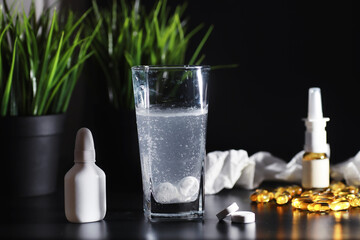 Composition from Bottles of cough syrup.Healthcare, medicine, flu and treatment concept - paper...