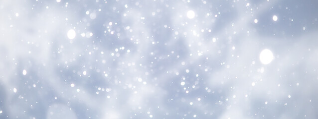 blue snowfall bokeh background, abstract snowflake background on blurred abstract blue