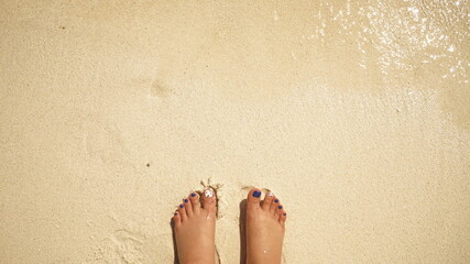feet on the beach