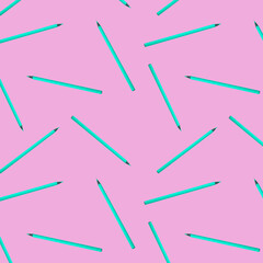 Seamless pattern with blue pencils on pink background. Art school education concept background.