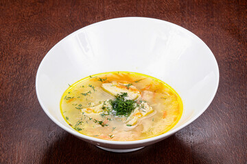 Chicken soup with vegetables and herbs