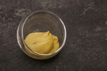 Dijon mustard sauce in the bowl