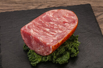 Beef ham piece over board